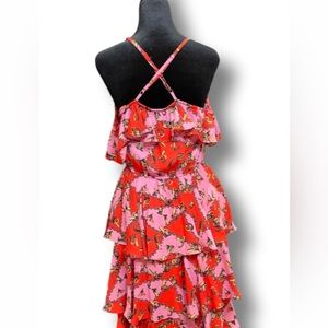 Bright summer dress, size small. Adjustable straps, lightweight material.